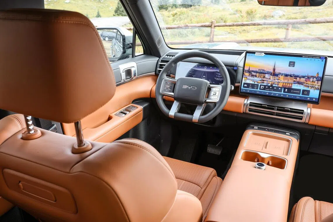 The cockpit of the BYD Ti7 is dominated by a 15.6-inch touchscreen and 10.25-inch instrument display.