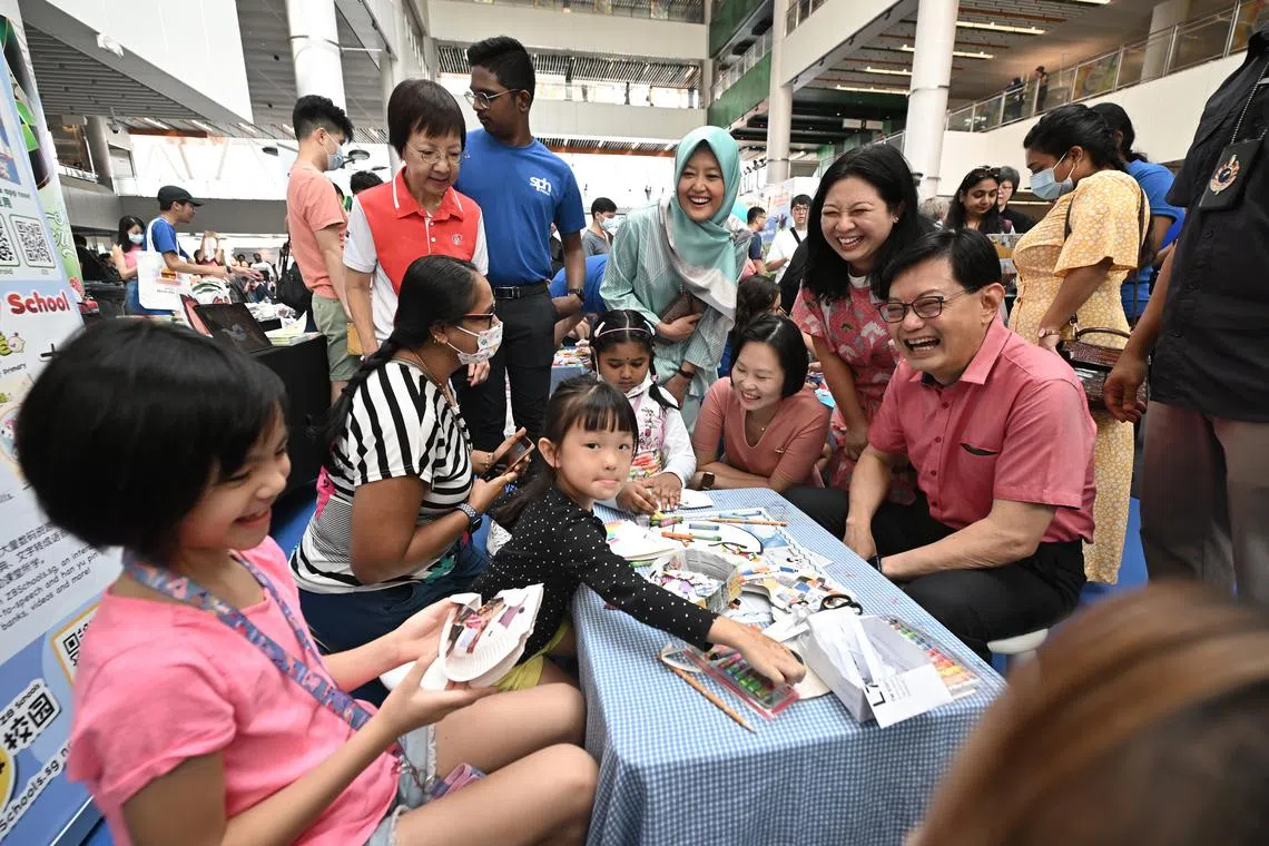 Deputy Prime Minister Heng Swee Keat touring the activity booths at the inaugural Bilingualism Carnival at One Punggol on April 8.