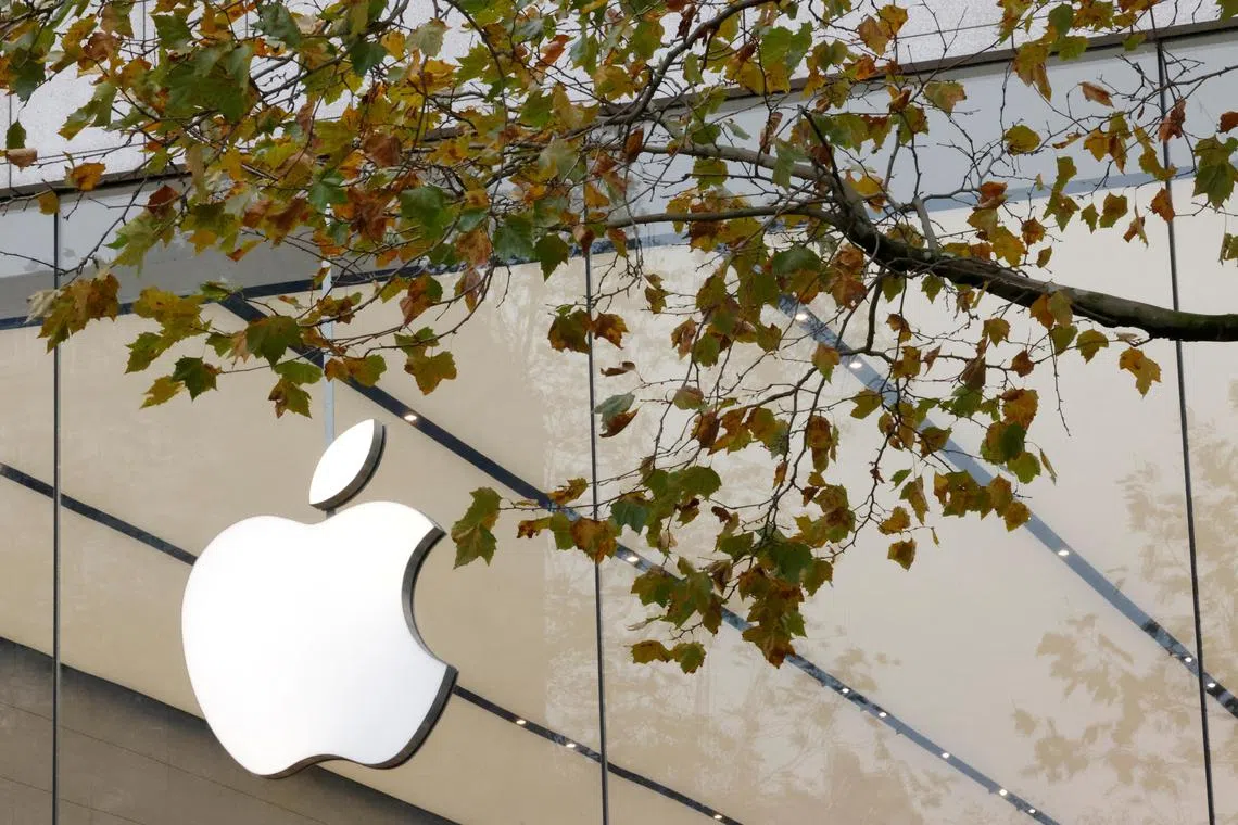 FILE PHOTO: The Apple Inc logo is seen at the entrance to the Apple store in Brussels, Belgium November 28, 2022. REUTERS/Yves Herman/File Photo