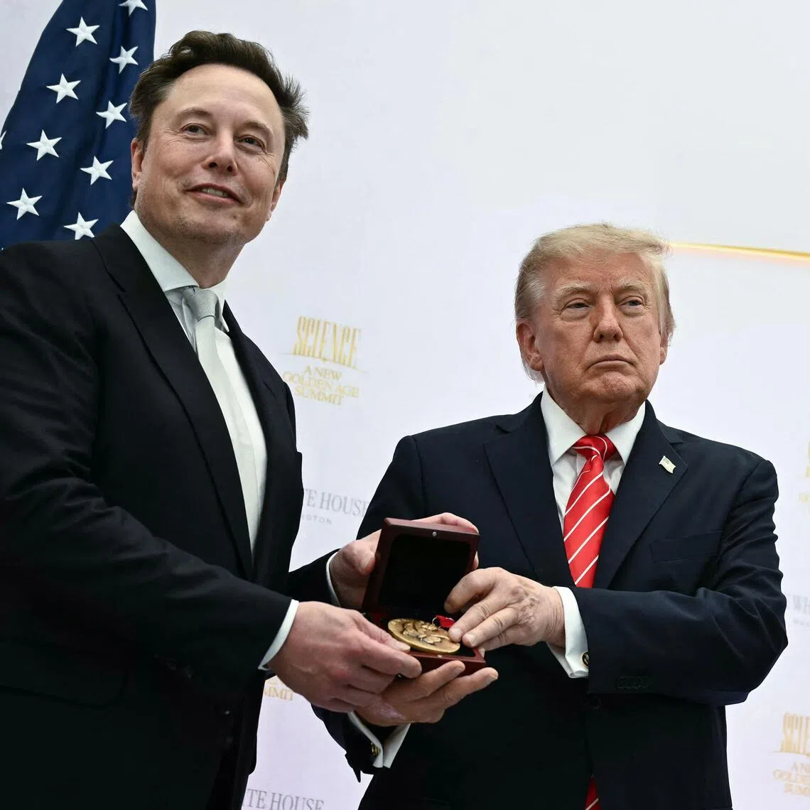 US President Donald Trump presenting the National Medal of Science to Elon Musk during the “Golden Age of American Innovation Summit” on Oct 8.