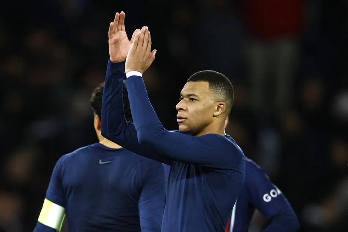 Soccer Football - Ligue 1 - Paris St Germain v Metz - Parc des Princes, Paris, France - December 20, 2023 Paris St Germain's Kylian Mbappe applauds fans after the match REUTERS/Sarah Meyssonnier