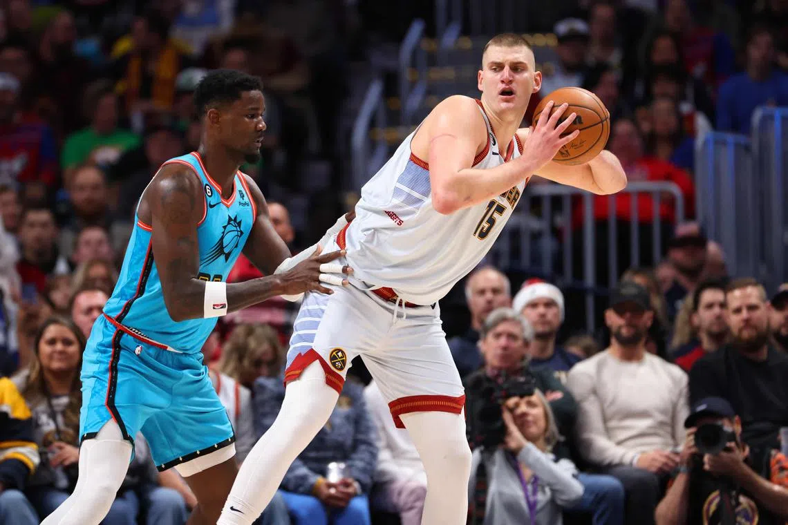 Two-time reigning National Basketball Association Most Valuable Player Nikola Jokic scored 41 points, grabbed 15 rebounds and passed off 15 assists to spark the Nuggets over visitors Phoenix 128-125.