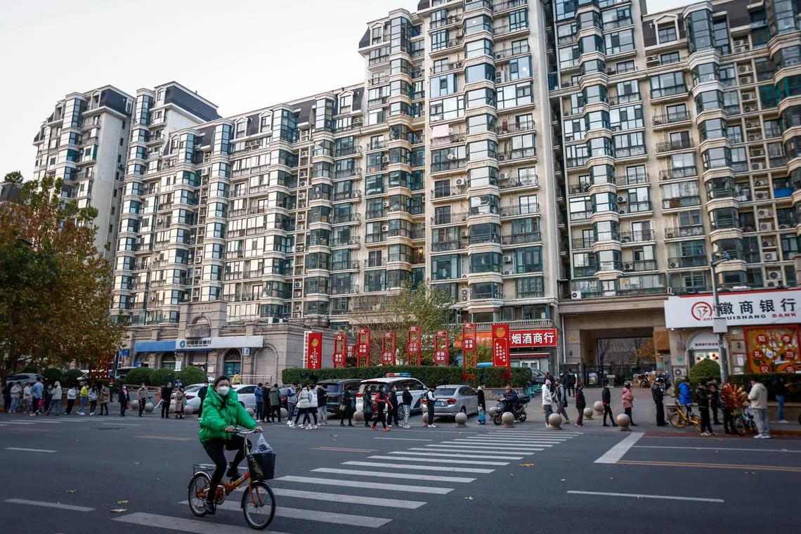 People lining up for a Covid-19 test in Beijing on Nov 22. 