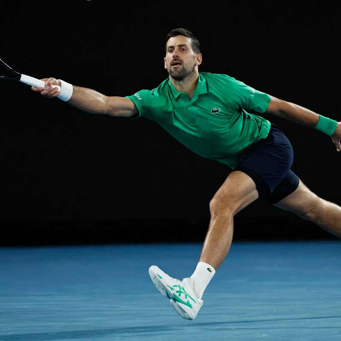 Tennis - Australian Open - Melbourne Park, Melbourne, Australia - January 24, 2026 Serbia's Novak Djokovic in action during his third round match against Netherlands' Botic van de Zandschulp REUTERS/Tingshu Wang