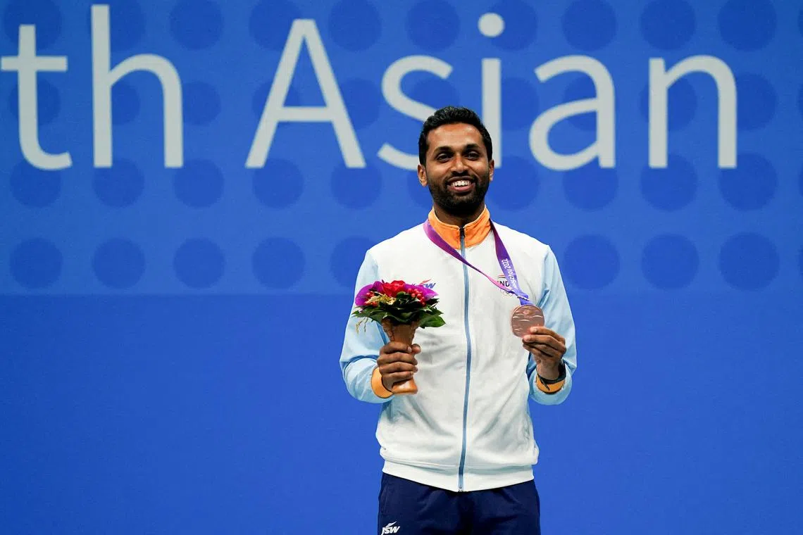 FILE PHOTO: Asian Games - Hangzhou 2022 - Badminton - Binjiang Gymnasium, Hangzhou, China - October 7, 2023 Bronze medallist India's Prannoy Haseena Sunil Kumar poses during the medal ceremony for the Men's Singles REUTERS/Weixiang Lim/File Photo