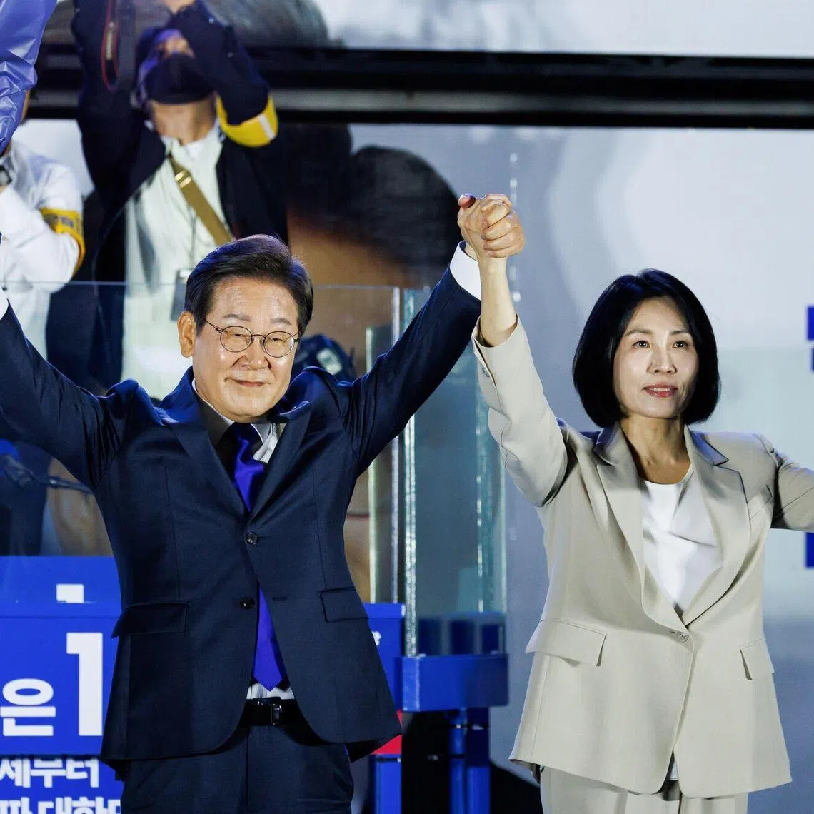 Mr Lee Jae-myung, presidential candidate for the Democratic Party, and his wife Kim Hye-gyeong at the party's election night event in Seoul, South Korea, on June 4. 