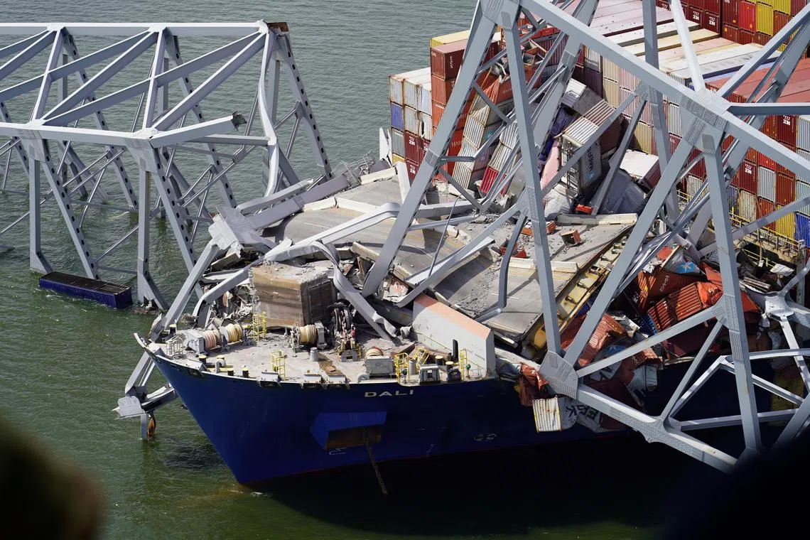Aerial view of the Dali cargo vessel which crashed into the Francis Scott Key Bridge, causing it to collapse in Baltimore, Maryland, U.S., March 26, 2024. Maryland National Guard/Handout via REUTERS. THIS IMAGE HAS BEEN SUPPLIED BY A THIRD PARTY 