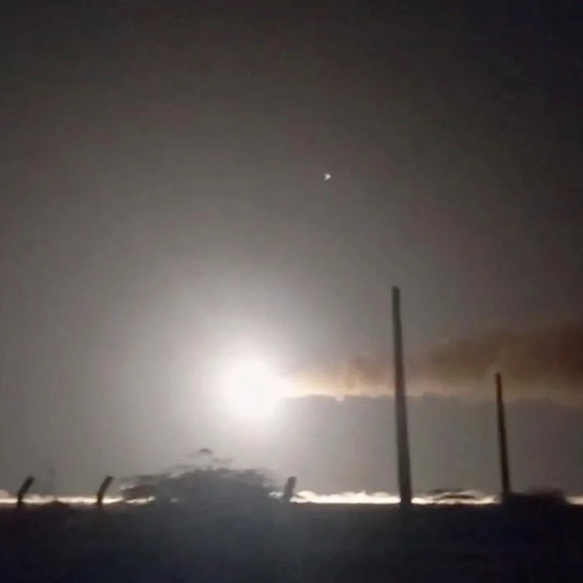The Iranian navy firing a missile at an unknown location, in this still image taken from a video released on May 8.