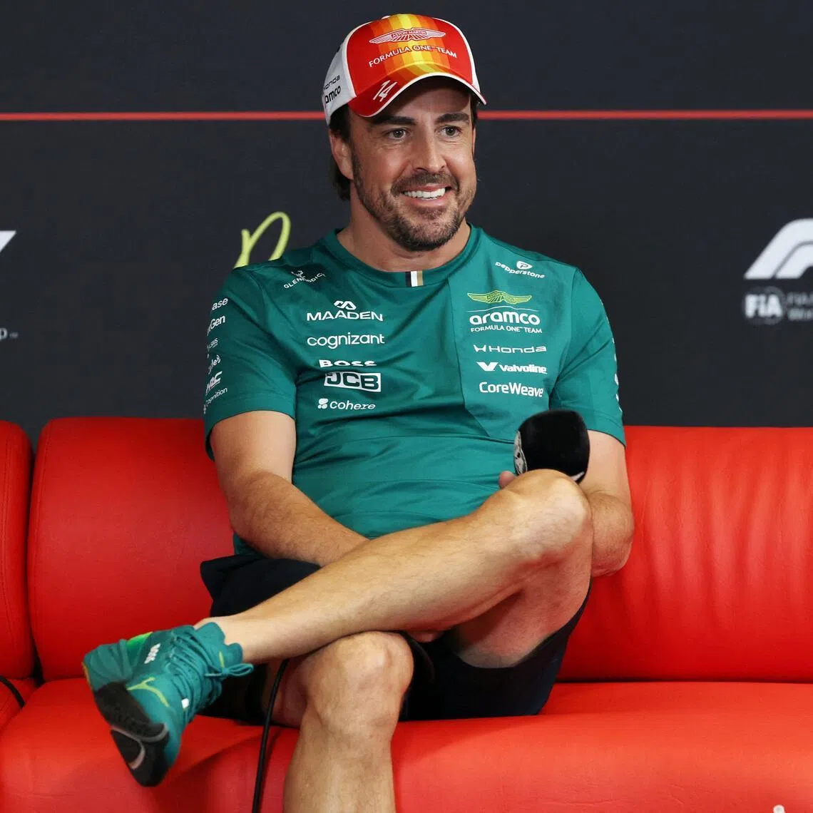Aston Martin's Spanish driver Fernando Alonso attends a press conference at the Circuit de Catalunya on June 11.
