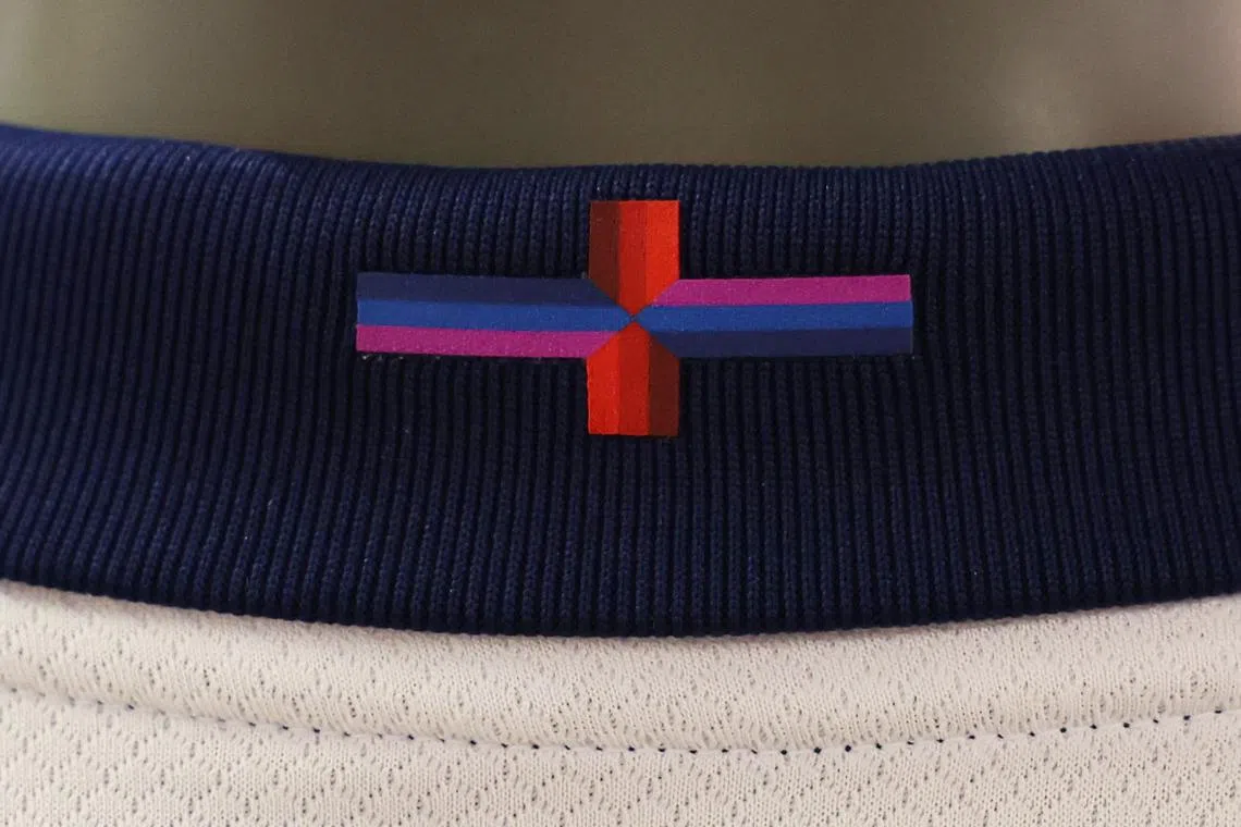 Soccer Football - A design of the St George's Cross is seen on the new England football shirt on display in the Wembley Stadium store in London, Britain - March 22, 2024 Action Images via Reuters/Paul Childs