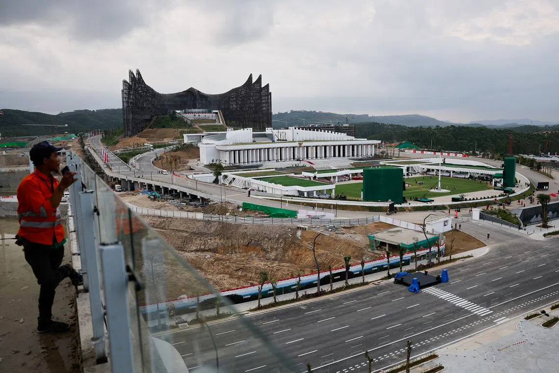 A construction worker looks on near the Garuda Palace, the future Presidential Palace, a day before the country's 79th Independence Day, in Indonesia's new capital city of Nusantara, in East Kalimantan province, August 16, 2024. REUTERS/Willy Kurniawan/File Photo
