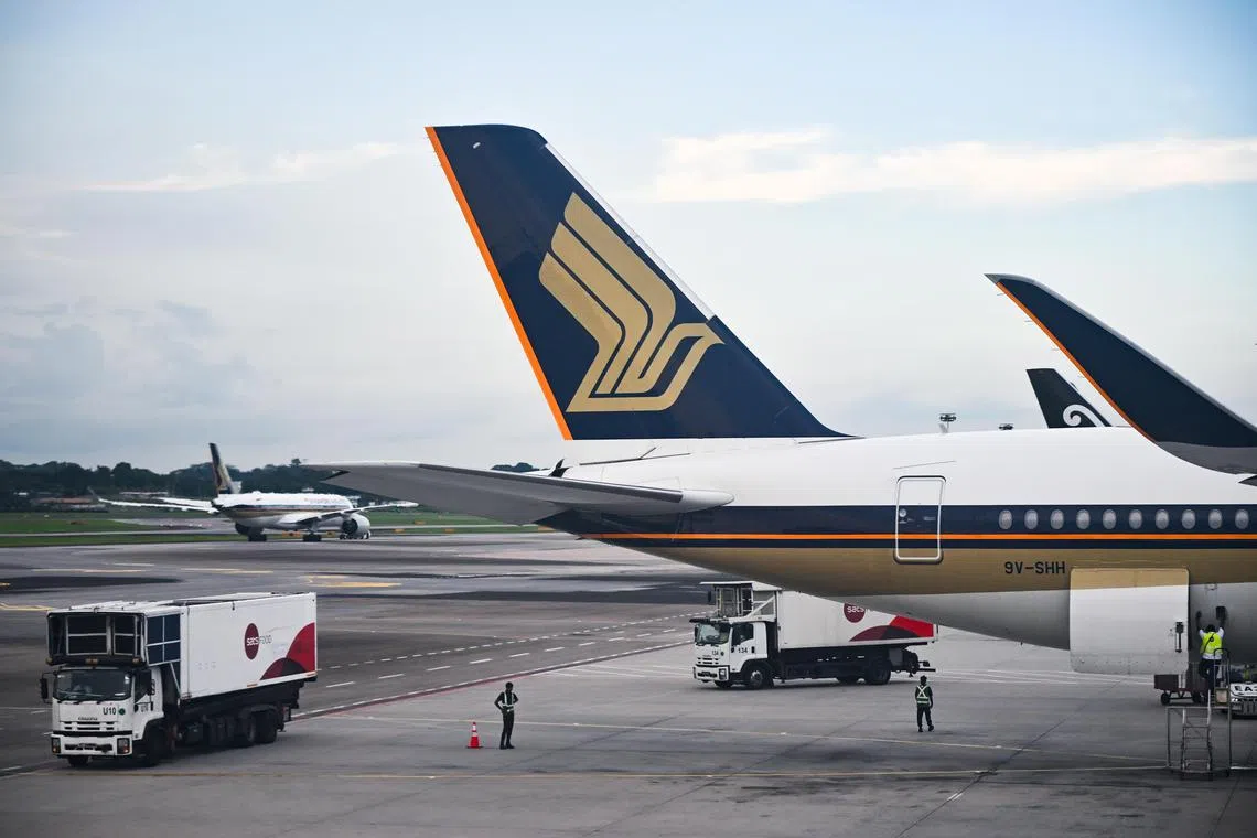 ST20240428-202498208747-Lim Yaohui-pixgeneric/
Generic photograph of Singapore Airlines (SIA) aeroplanes and SATS vehicle at Changi Airport on April 30, 2024.
Can be used for stories on cabin, carrier, commercial, airline, pilot, plane, oil, pollution, air, aviation, airport, fuel, travel, business and money.
(ST PHOTO: LIM YAOHUI)