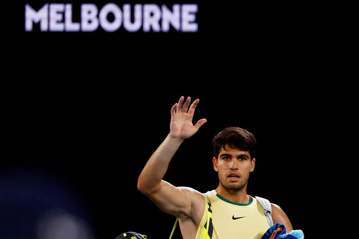 Spain's Carlos Alcaraz walks off the court after losing his quarter-final match against Germany's Alexander Zverev.