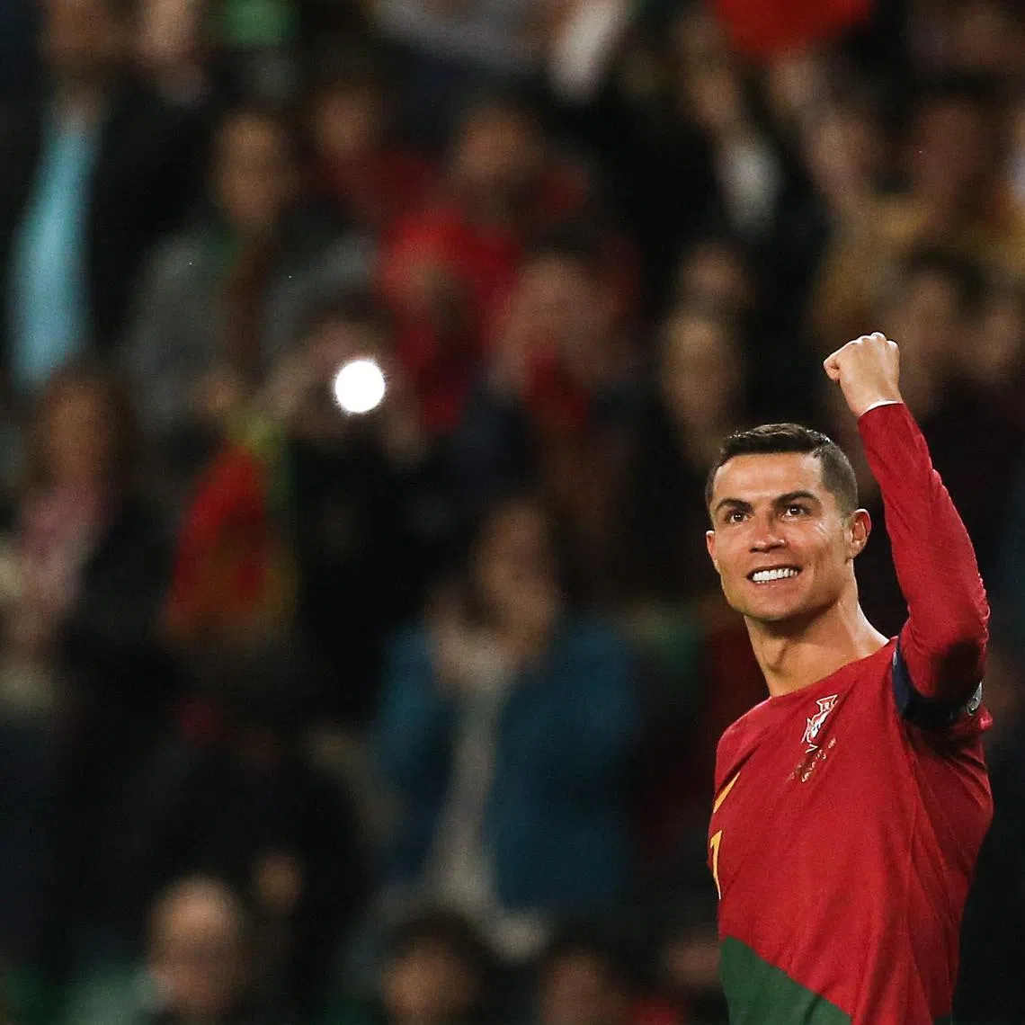 Portugal's forward Cristiano Ronaldo celebrates scoring his team's third goal against Liechtenstein.