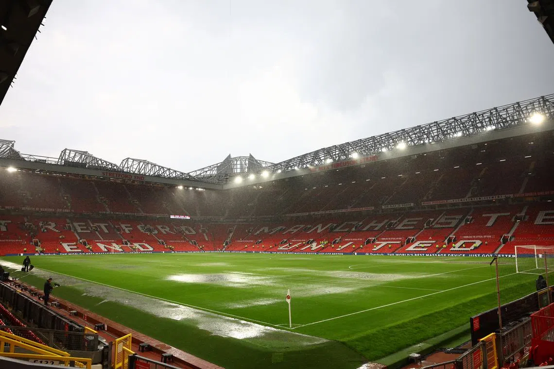 Soccer Football - Premier League - Manchester United v Arsenal - Old Trafford, Manchester, Britain - May 12, 2024 General view of rain fall pooling on the pitch after the match REUTERS/Carl Recine
