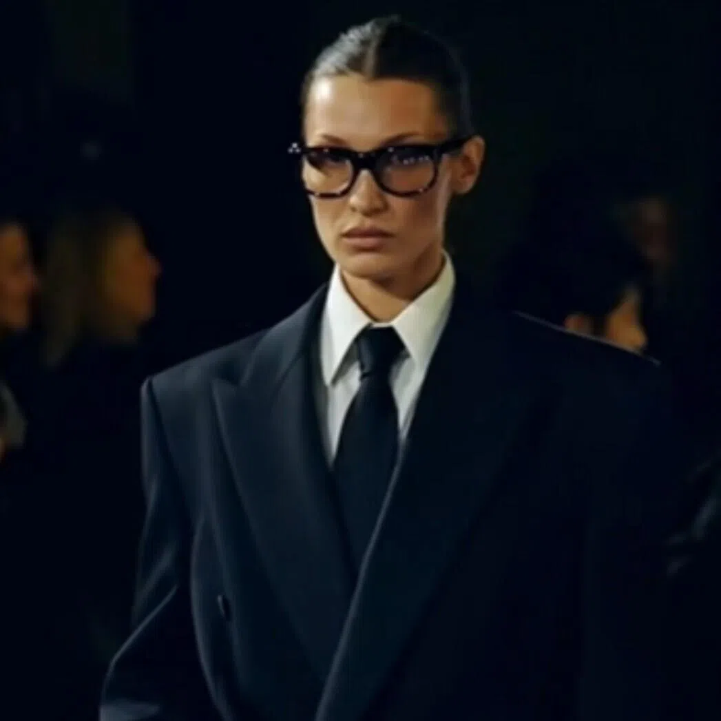 Model Bella Hadid walking for Saint Laurent at the Spring/Summer show in 2025. 