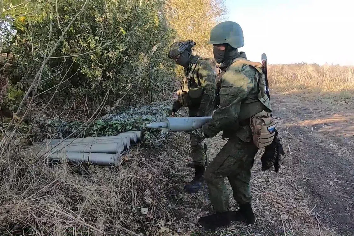 Russian troops prepare to shell Ukrainian positions around the area of Kupiansk in eastern Ukraine. 