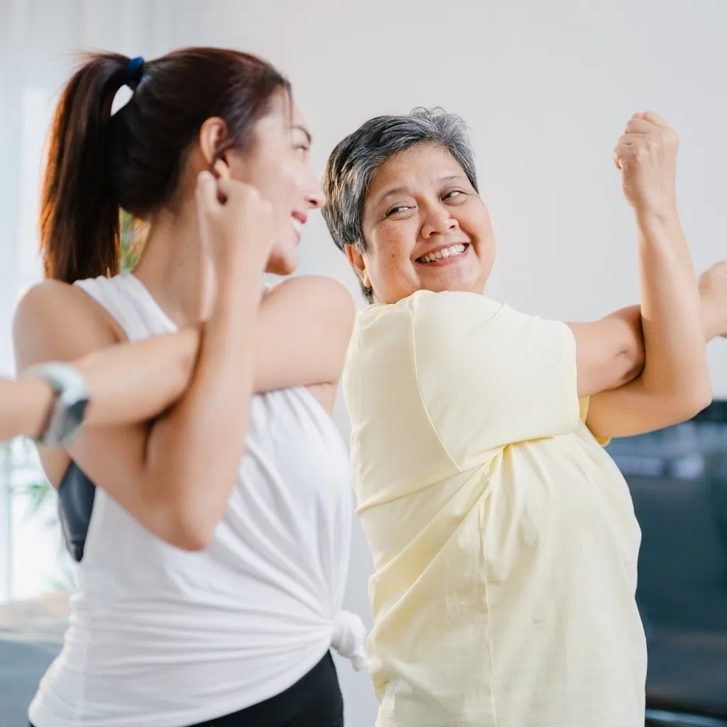 mother and daughter exercising