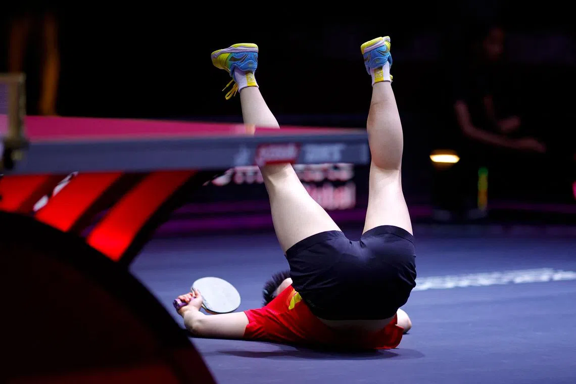 China's Sun Yingsha reacting after winning the women's singles final match at the ITTF World Table Tennis Championships finals in Doha, on May 25, 2025. 