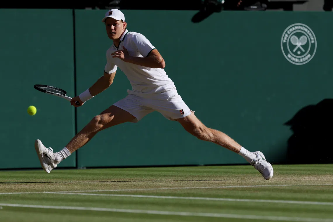 Jul 12, 2026; London, United Kingdom; Jannik Sinner (ITA) reaches for a forehand against Alexander Zverev (GER) (not pictured) in the gentlemen's singles final of The Championships Wimbledon 2026 at All England Lawn Tennis and Croquet Club. Mandatory Credit: Geoff Burke-Imagn Images