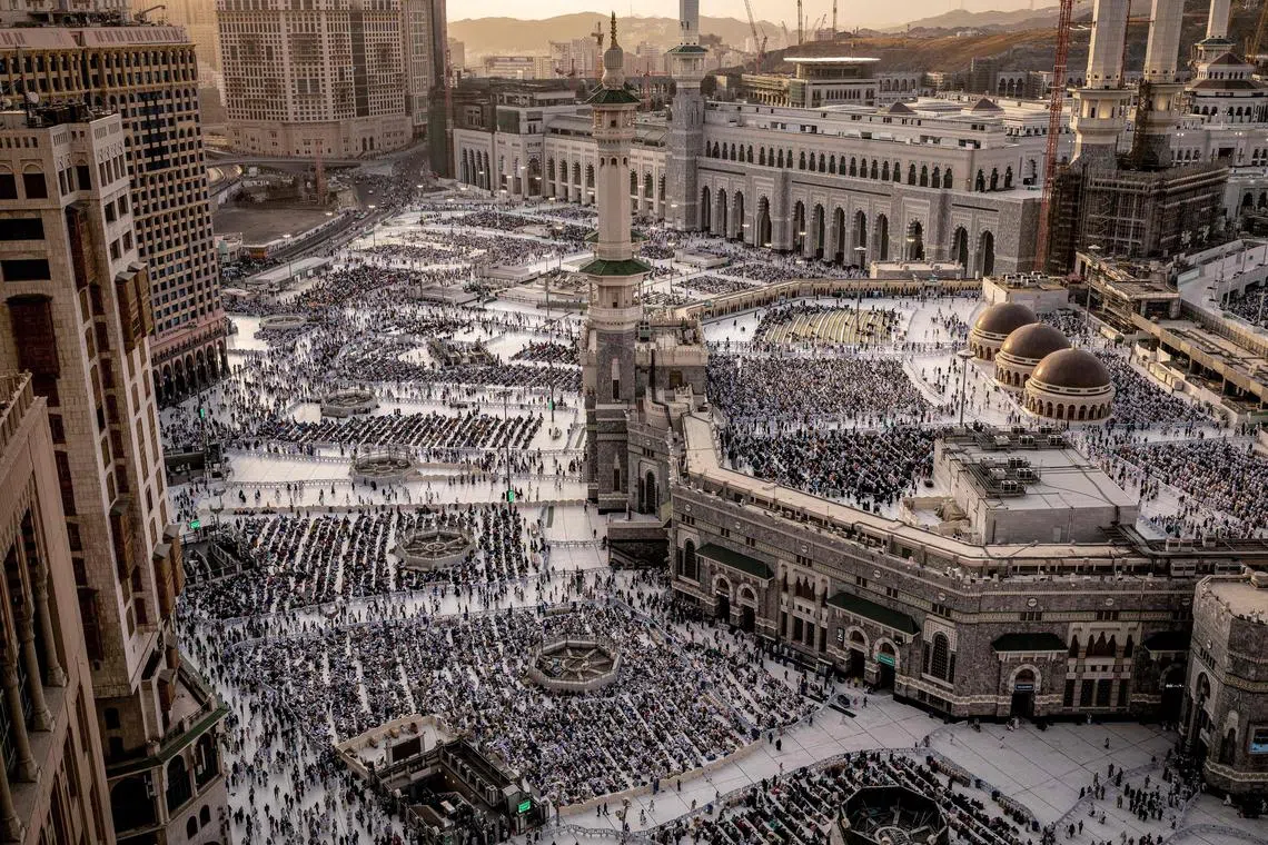 Muslim worshippers walk at the Grand Mosque in Saudi Arabia's holy city of Mecca ahead of the annual hajj pilgrimage.  