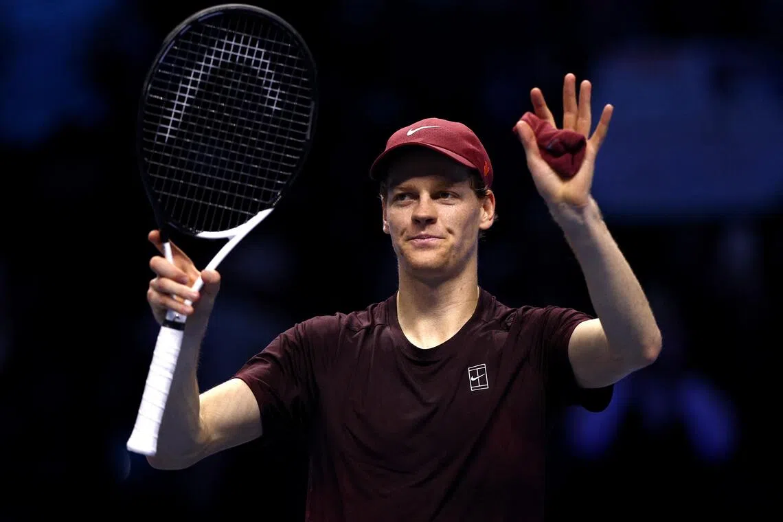 Italy's Jannik Sinner celebrates winning his group stage match against Germany's Alexander Zverev.