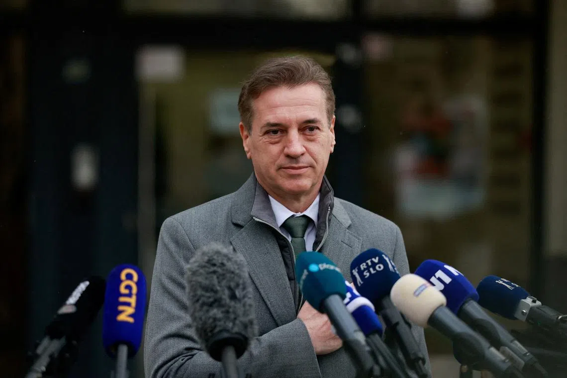 FILE PHOTO: Slovenia's Prime Minister Robert Golob speaks to the media after voting during the parliamentary election in Ljubljana, Slovenia, March 22, 2026. REUTERS/Borut Zivulovic/File Photo