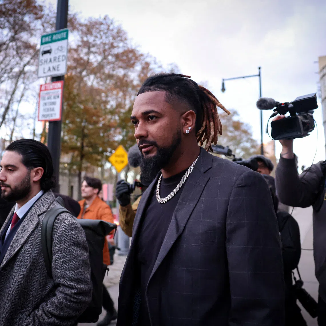 Cleveland Guardians pitcher Emmanuel Clase de la Cruz exits the Brooklyn Federal courthouse, following his arraignment on charges of sports betting and money laundering conspiracy in Major League Baseball games, in Brooklyn, New York, U.S., November 13, 2025.  REUTERS/Brendan McDermid