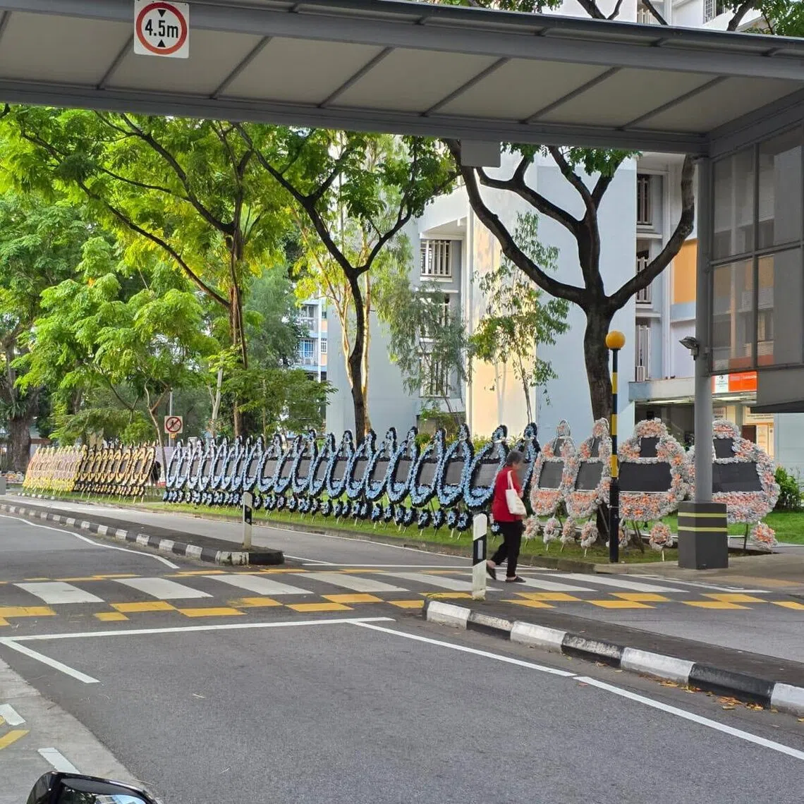 Seventy LED wreaths were placed opposite Pek Kio Community Centre along Gloucester Road for an ongoing wake.
