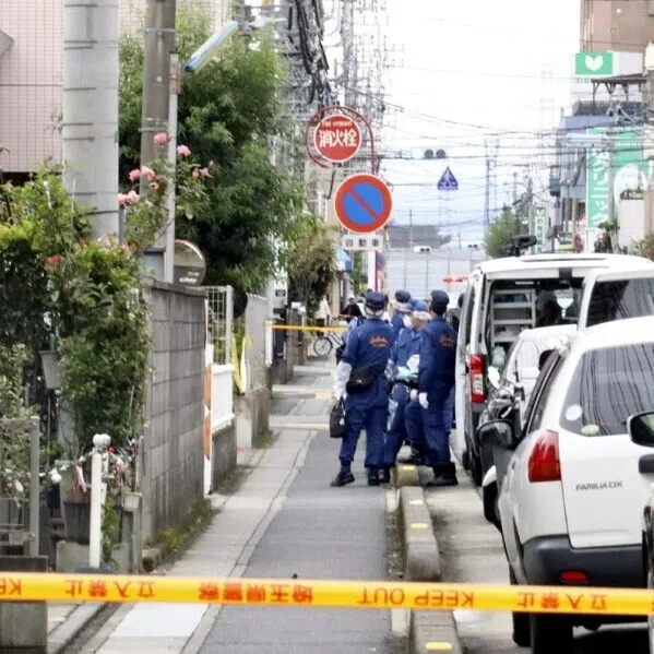Investigators outside the nursing home where two residents were allegedly killed, in Tsurugashima, Saitama prefecture, on Oct 15. 
