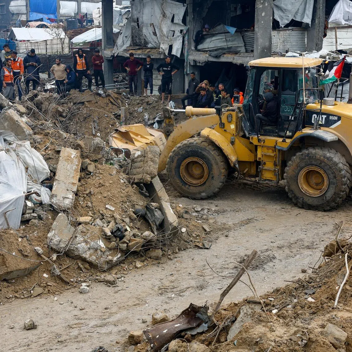 A search for victims going on in the northern Gaza Strip on Dec 12, after heavy rains caused a house to collapse.