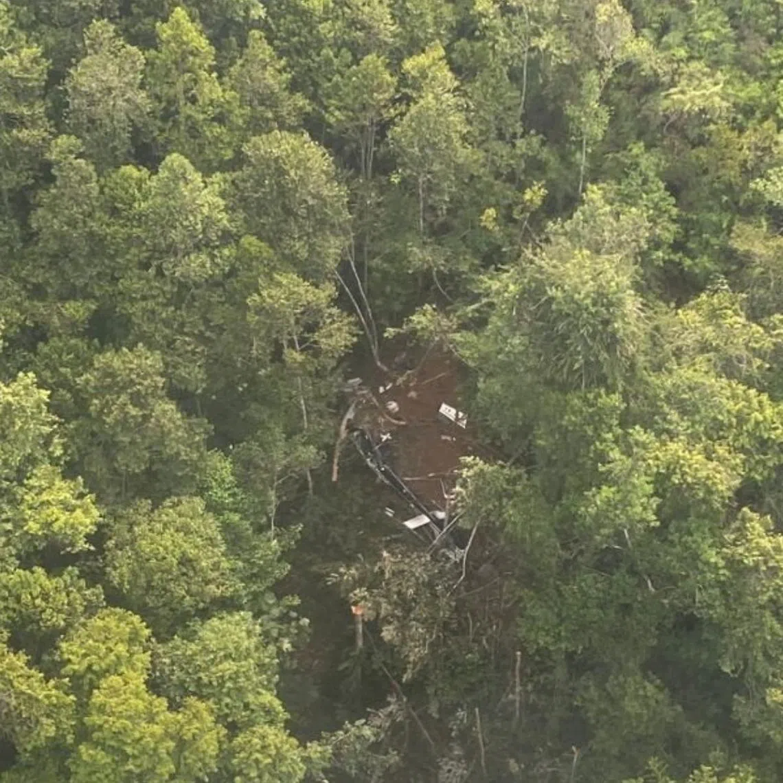 Rescuers, including military and police personnel, were trying to reach the crash site via land routes on April 17.