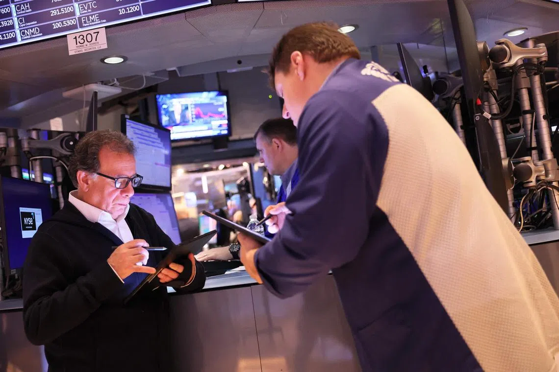 Traders work on the floor of the New York Stock Exchange, during morning trading, on Feb 10, 2023 in New York City.