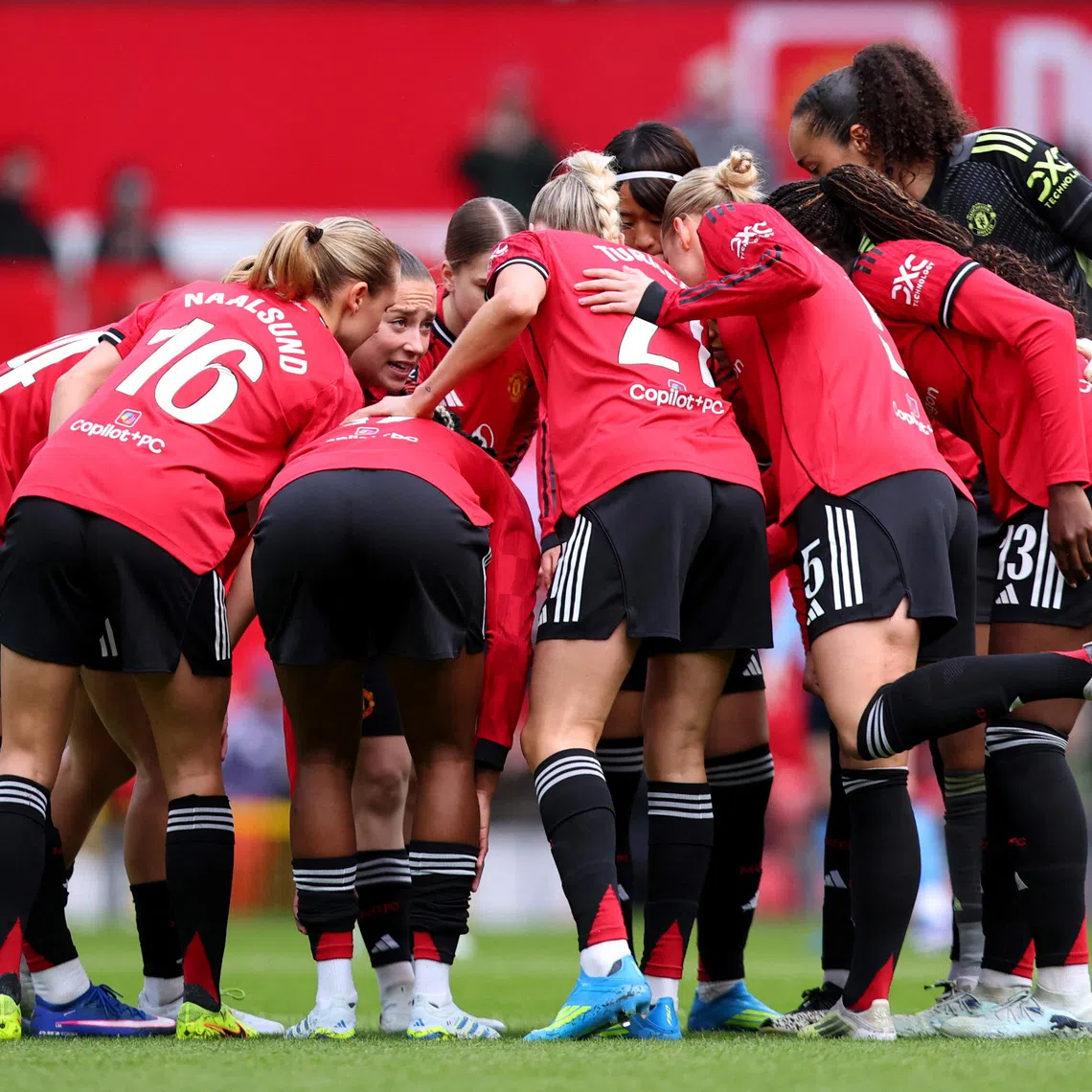FILE PHOTO: Soccer Football - Women's Super League - Manchester United v Manchester City - Old Trafford, Manchester, Britain - March 28, 2026 Manchester United players huddle before the match Action Images via Reuters/Craig Brough/ File Photo