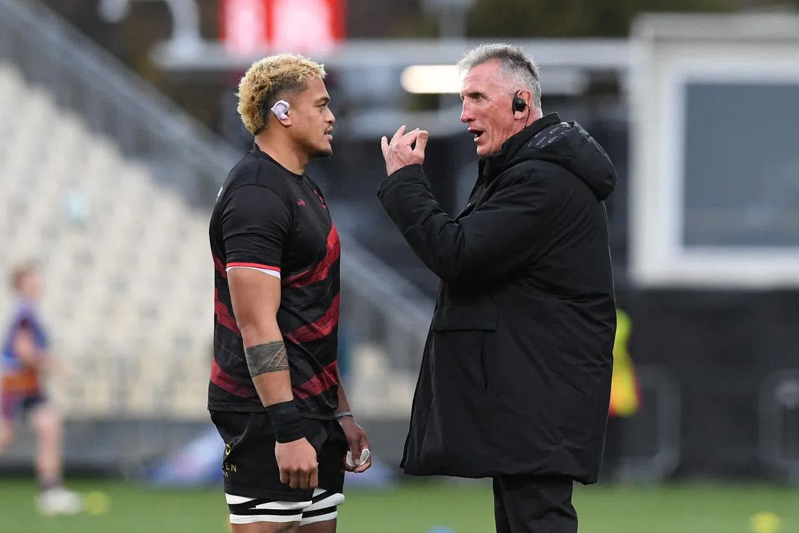 Crusaders head coach Rob Penney with Christian Lio-Willie before their Super Rugby Pacific match against Queensland Reds on May 4, 2024.