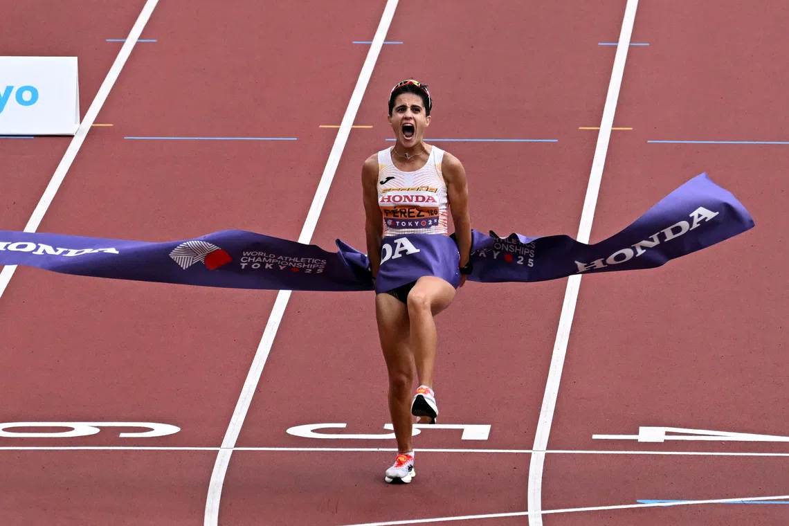 World Athletics Championships Tokyo 2025 - Women's 20km Race Walk Final - Japan National Stadium, Tokyo, Japan - September 20, 2025 Spain's Maria Perez reacts as she wins the Women's 20km Race Walk Final REUTERS/Dylan Martinez