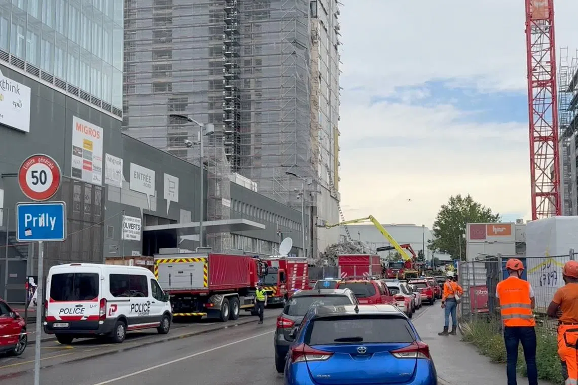 Emergency crews work at the site of building folllowing scaffolding incident, in Prilly, Switzerland, July 12, 2024, in this screen grab taken from a video. Raphael Jotterand/via REUTERS