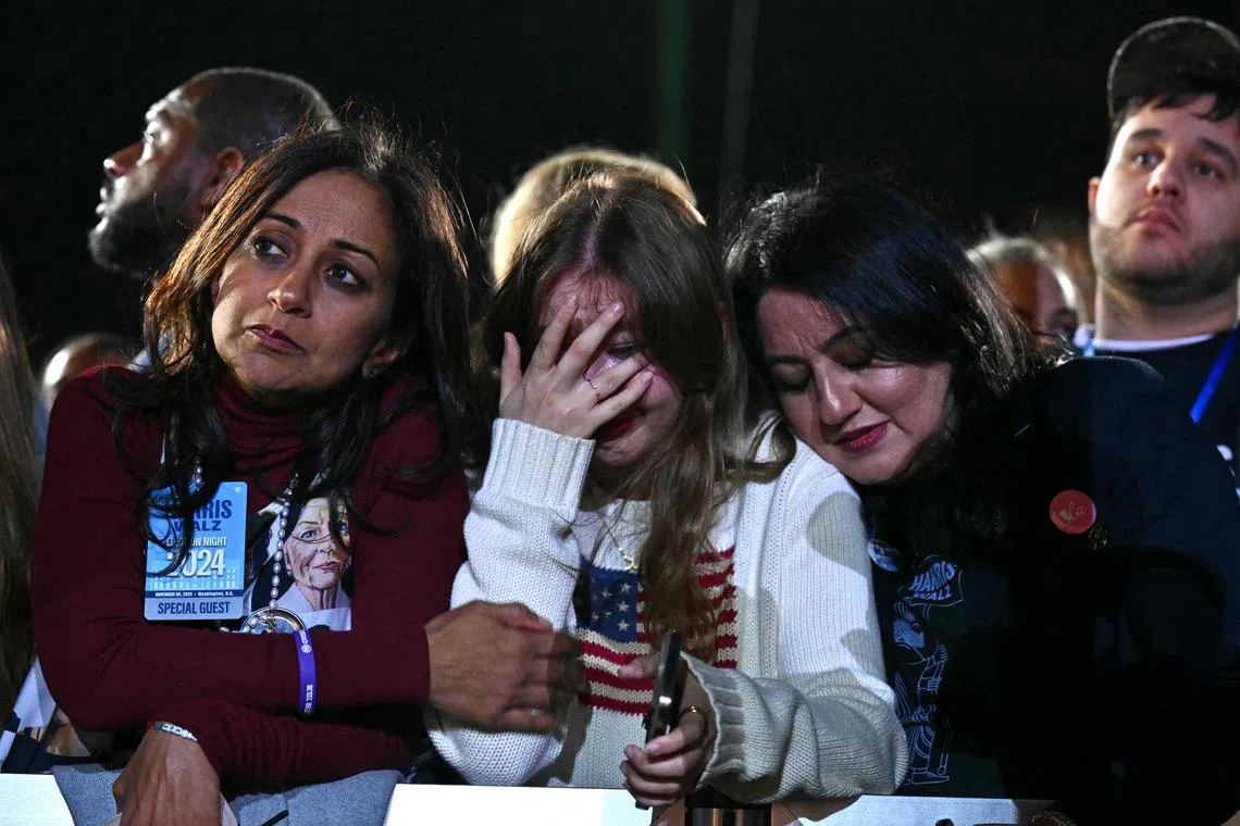 Supporters react to election results during an election night event for US Vice President and Democratic presidential candidate Kamala Harris at Howard University in Washington, DC, on November 5, 2024. (Photo by ANGELA WEISS / AFP)