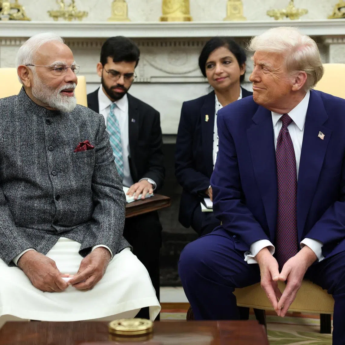FILE PHOTO: U.S. President Donald Trump meets with Indian Prime Minister Narendra Modi at the White House in Washington, D.C., U.S., February 13, 2025. REUTERS/Kevin Lamarque/File Photo