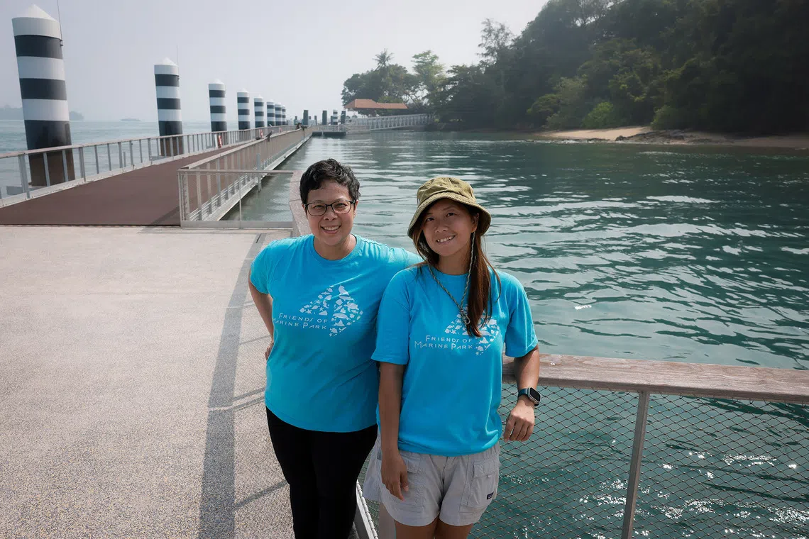 Marine biologists Sam Shu Qin (with hat) and Jani Tanzil, co-chairs of the Friends of Marine Park community, at Sisters’ Islands Marine Park on Sept 30, 2026. The marine park has been designated a Hope Spot by Mission Blue, an international marine conservation organisation founded by oceanographer Sylvia Earle.
