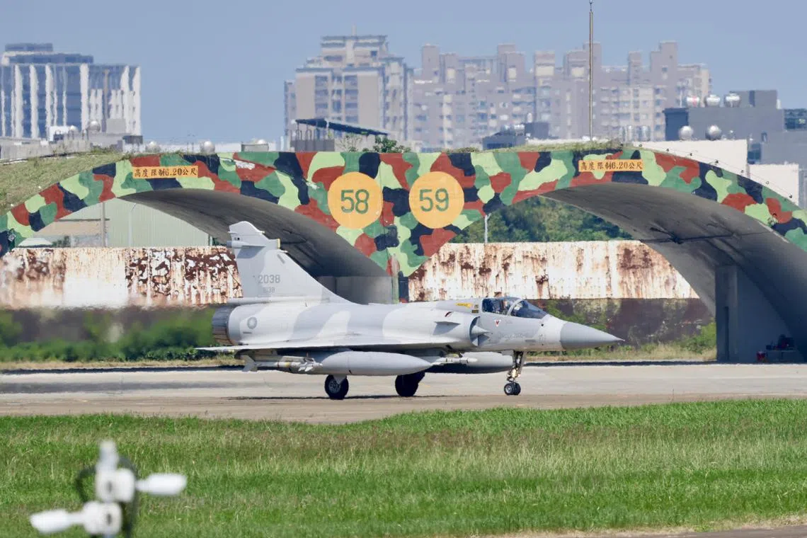 epa11657884 A Taiwan Air Force Mirage 2000 fighter jet prepares to take off inside the airbase in Hsinchu, Taiwan, 14 October 2024. China announced on 14 October that it will conduct the 'Joint Sword-2024B' military drills around Taiwan.  EPA-EFE/RITCHIE B. TONGO