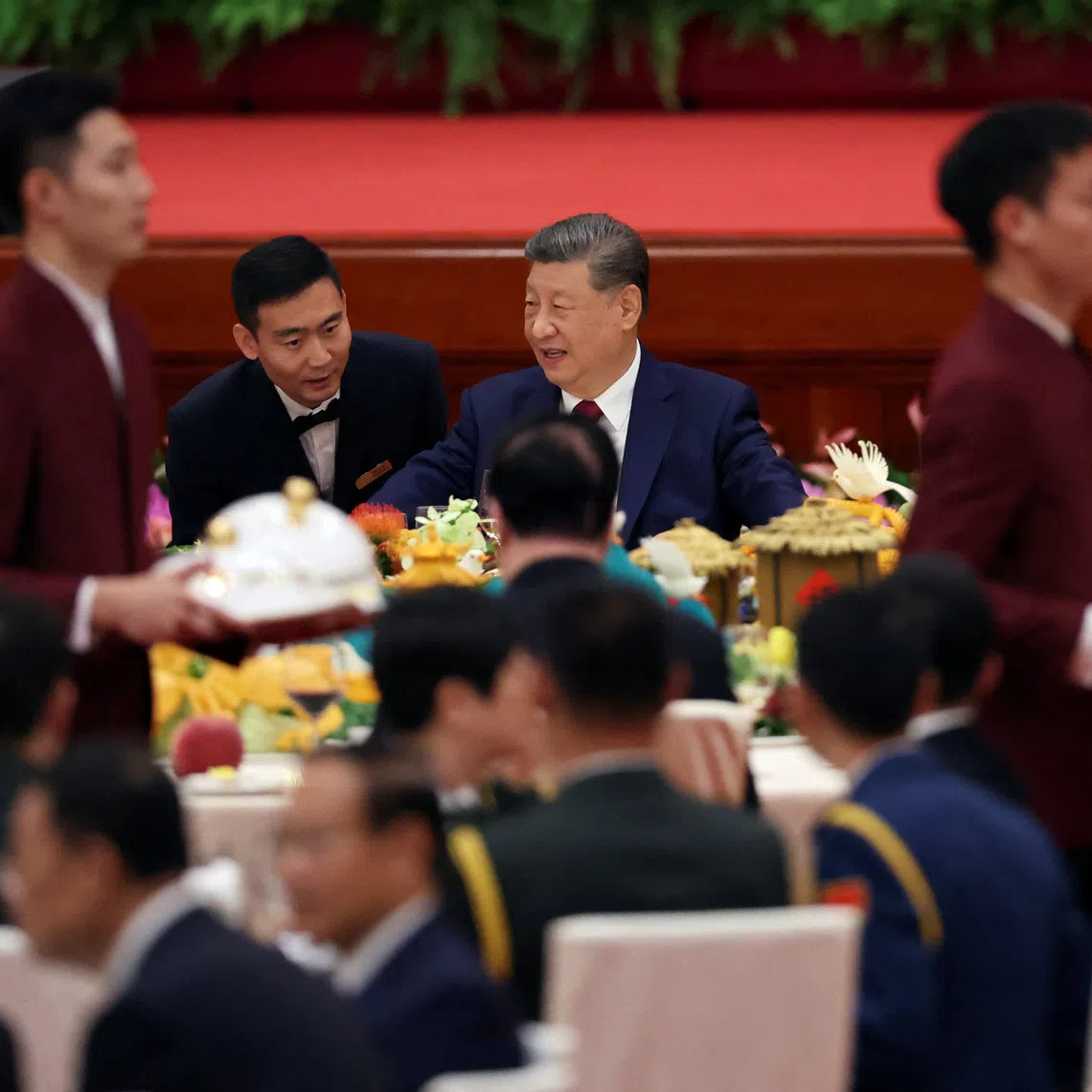 Chinese President Xi Jinping attends the National Day reception alongside Premier Li Qiang and National People's Congress (NPC) Standing Committee Chairman Zhao Leji, on the eve of the 77th founding anniversary of the People's Republic of China, at the Great Hall of the People in Beijing, China September 30, 2026. REUTERS/Florence Lo/Pool