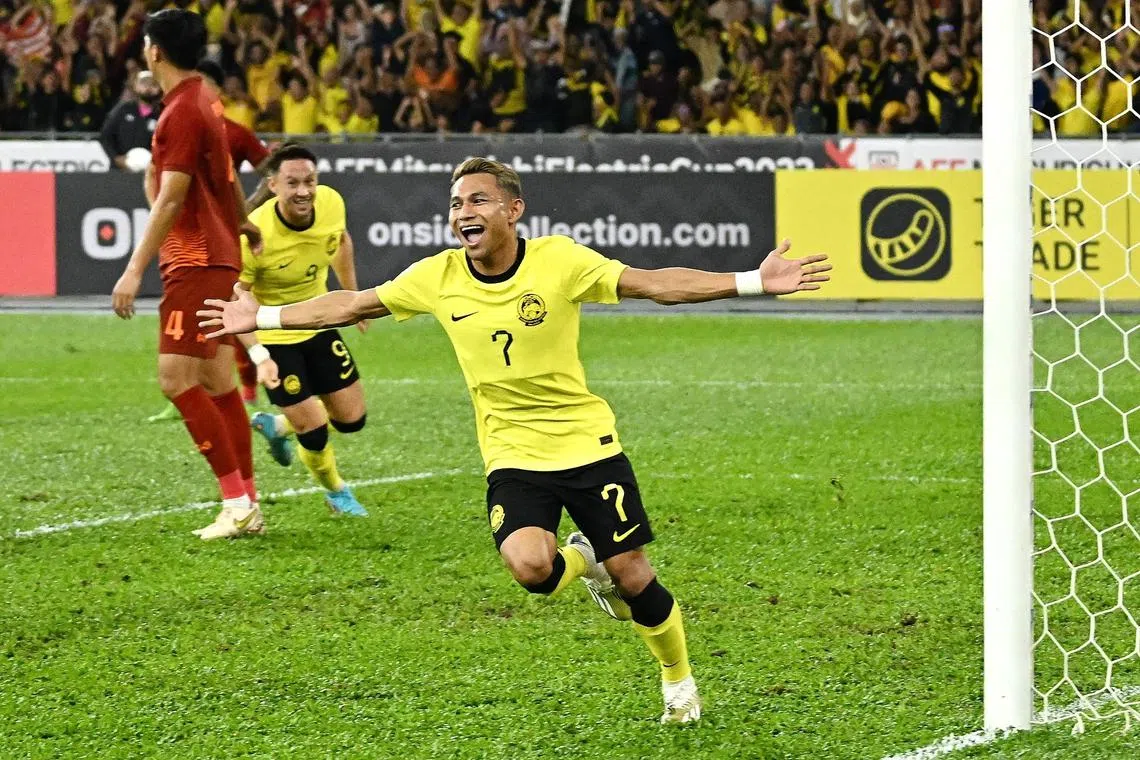 Malaysia's Faisal Halim celebrates after scoring against Thailand in the Asean Football Federation semi-final, first leg at Bukit Jalil National Stadium in Kuala Lumpur on Jan 7.