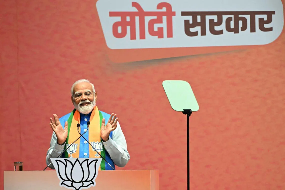 India's Prime Minister Narendra Modi speaks after releasing the BJP manifesto ahead of country's upcoming general elections, at the party headquarters in New Delhi on April 14.
