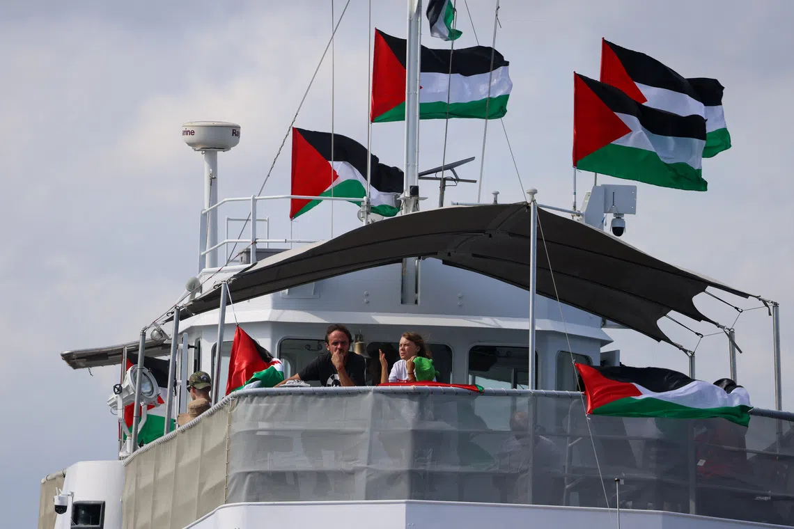 Swedish activist Greta Thunberg departs with other activists on the Global Sumud Flotilla, a humanitarian expedition to Gaza, from the port of Barcelona, Spain August 31, 2025. REUTERS/Nacho Doce/File Photo