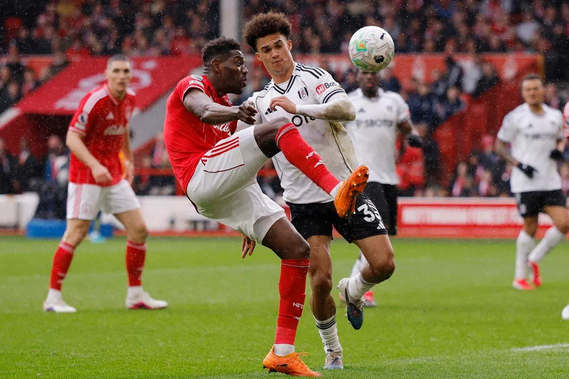Soccer Football - Premier League - Nottingham Forest v Fulham - The City Ground, Nottingham, Britain - March 15, 2026 Nottingham Forest's Ibrahim Sangare in action with Fulham's Antonee Robinson Action Images via Reuters/Andrew Couldridge