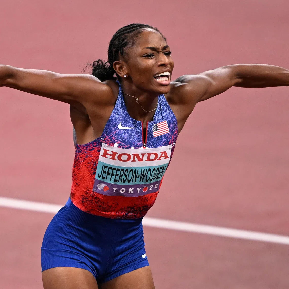 World Athletics Championships Tokyo 2025 - Women's 100m Final - Japan National Stadium, Tokyo, Japan - September 14, 2025  Melissa Jefferson-Wooden of the U.S. celebrates after winning the women's 100m Final REUTERS/Dylan Martinez