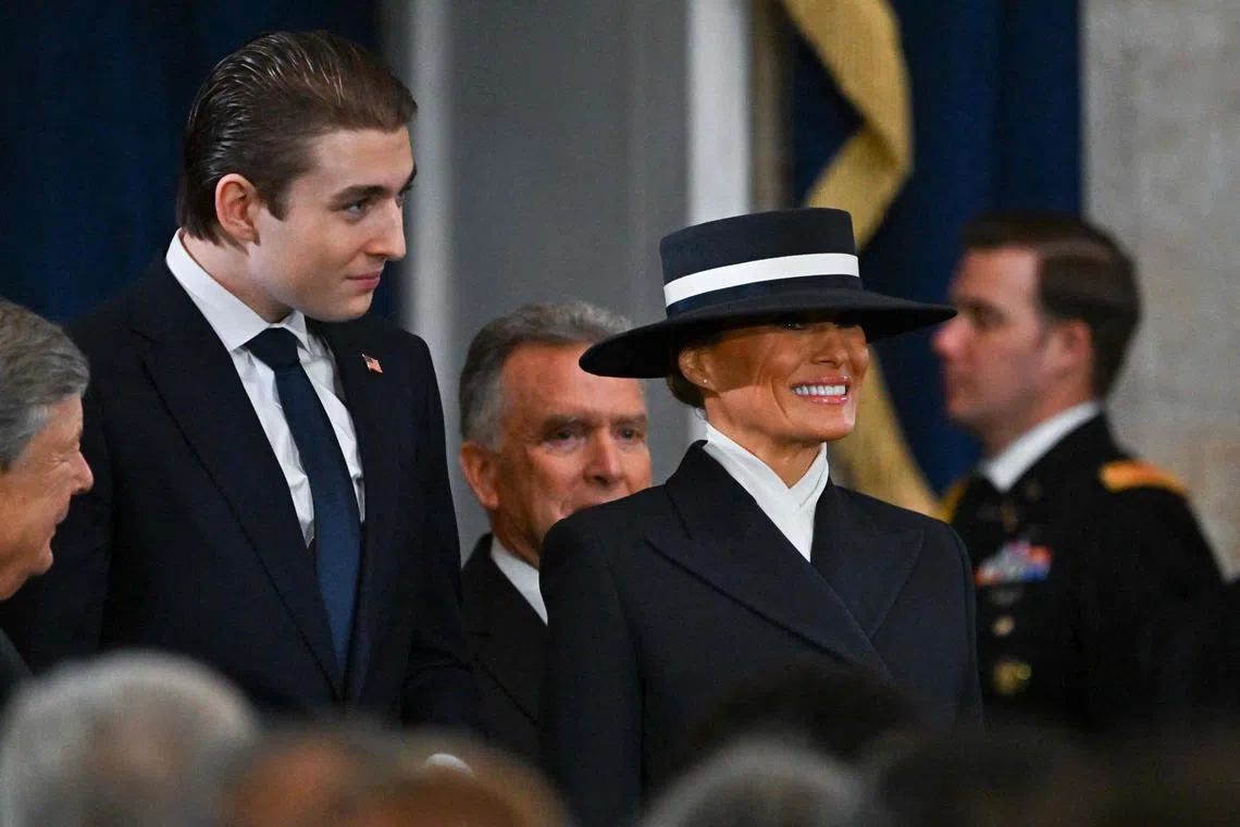 Mr Barron Trump (left) and his mother, Mrs Melania Trump, arrive for the 60th inaugural ceremony at the US Capitol in Washington DC. 