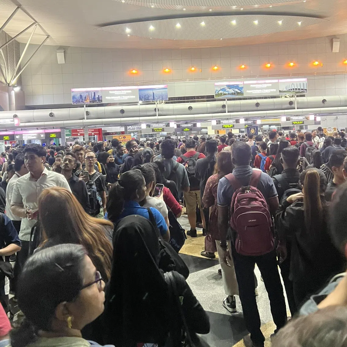 An official said long queues were reported at both land checkpoints in Johor as it was “peak time” for Malaysians rushing to Singa­pore for work.