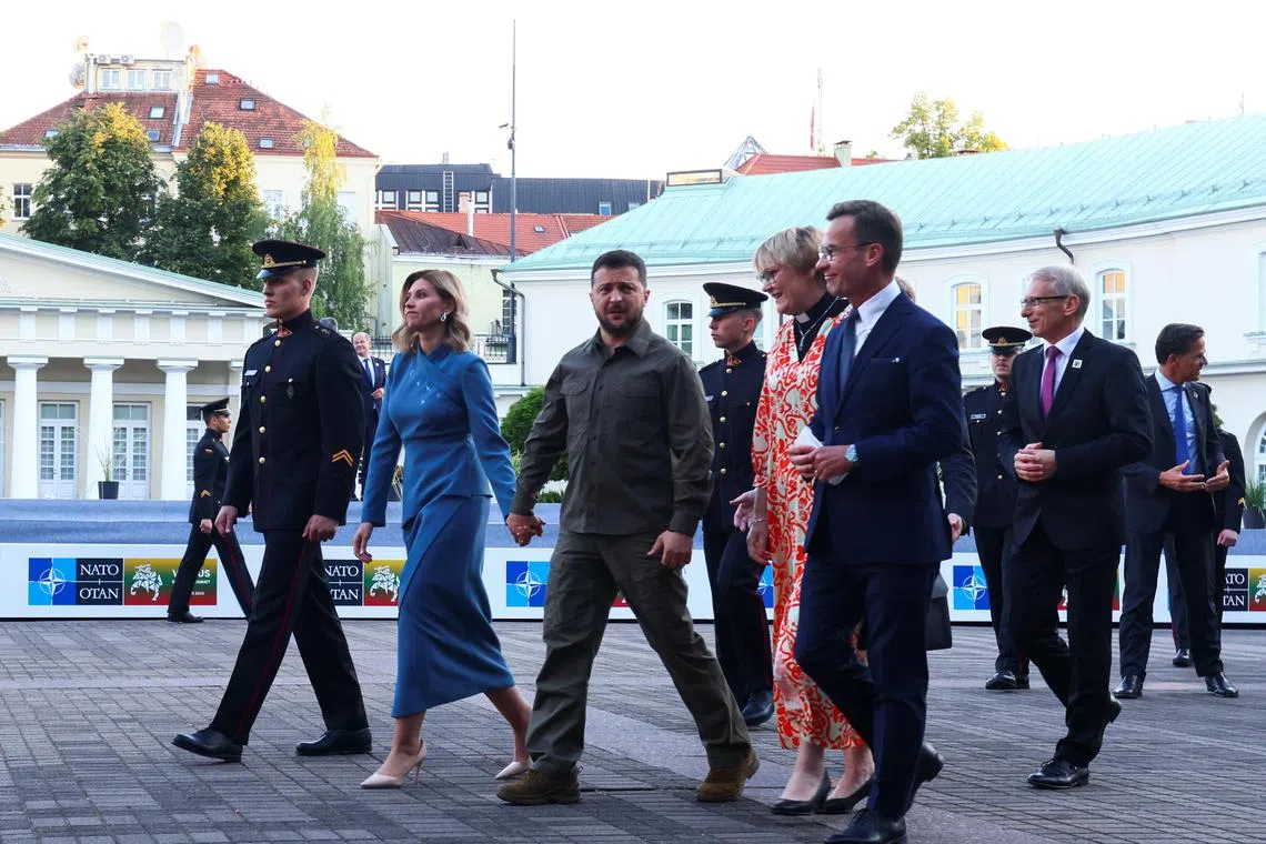 Ukraine's President Volodymyr Zelensky and his wife Olena Zelenska, and Sweden's Prime Minister Ulf Kristersson and his wife Birgitta Ed attend a dinner hosted by Lithuanian President Gitanas Nauseda in Vilnius.